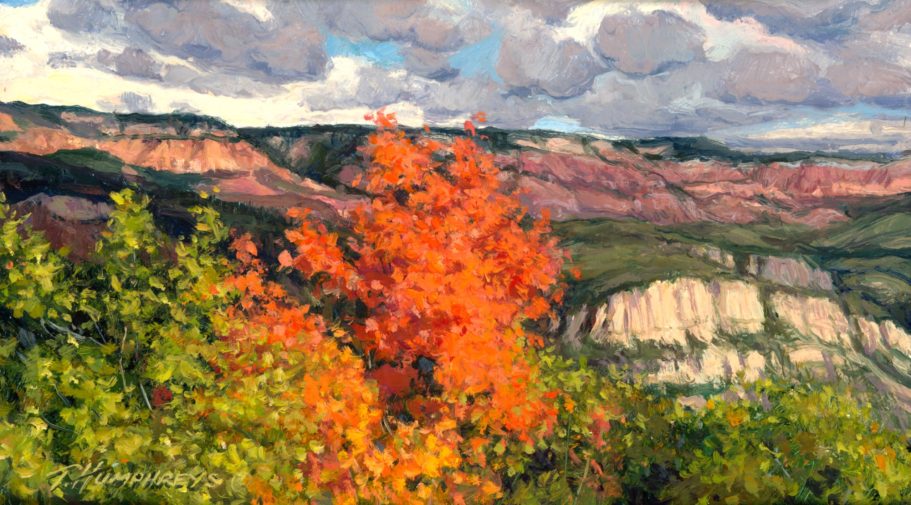 Cedar Mountain Fall Vibrant autumn foliage with an orange tree against a scenic landscape of cliffs and clouds.