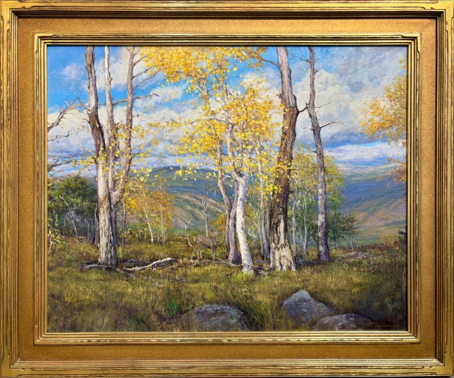 Second Glance Autumn landscape with golden birch trees and a distant mountain view.