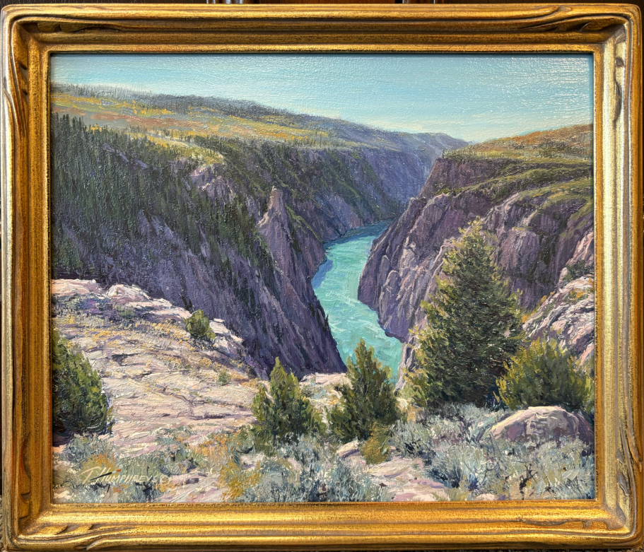 Gunnison Below A serene landscape featuring a river winding through rocky canyons and green trees.